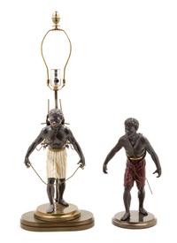 Two Cast Metal Blackamoor Figures Height of lamp overall 26 1/2 inches. — 20TH CENTURY