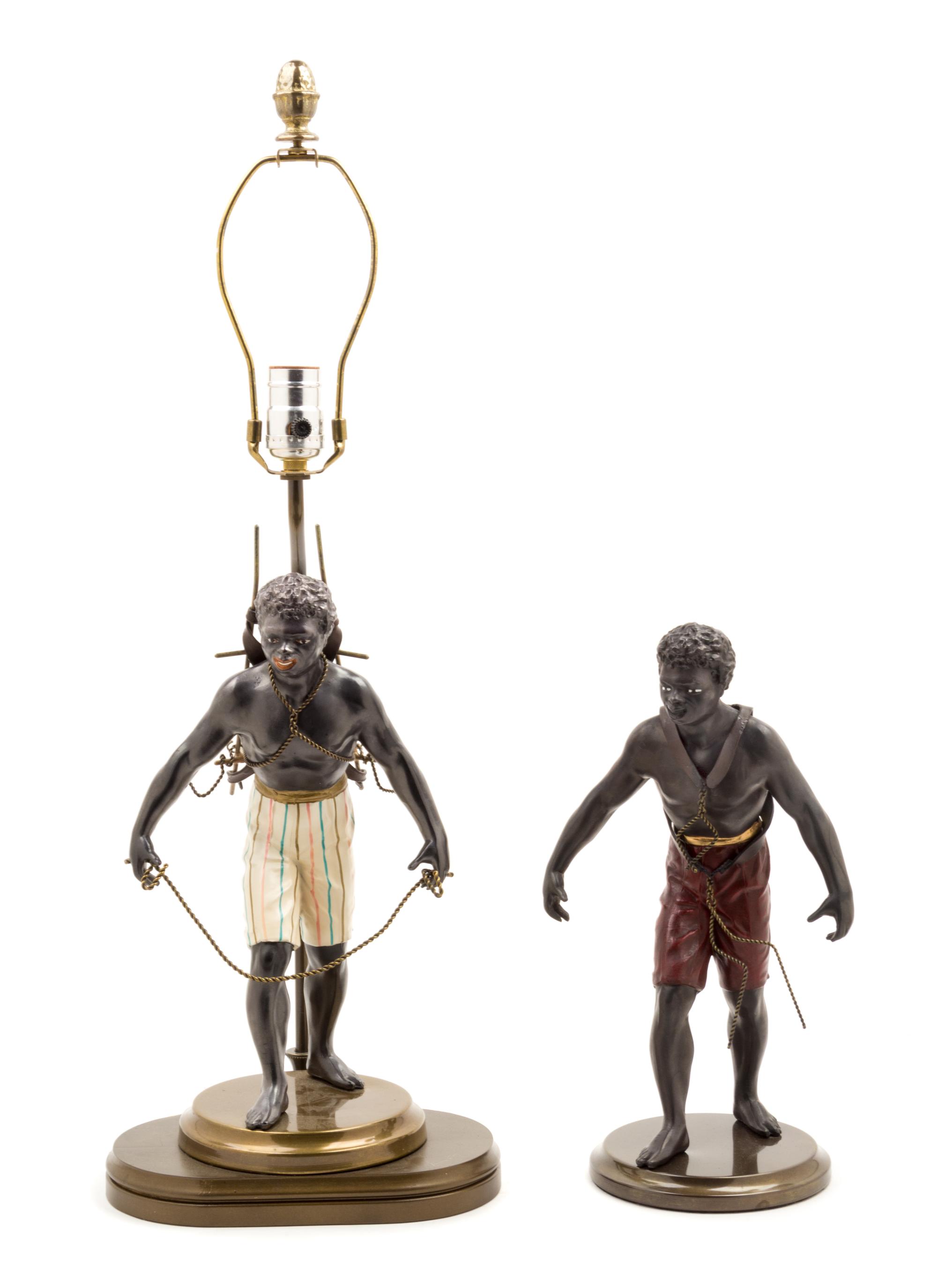 Two Cast Metal Blackamoor Figures Height of lamp overall 26 1/2 inches. — 20TH CENTURY
