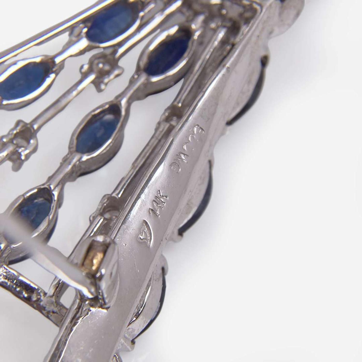 A Collection of 14K White Gold, Diamond, and Sapphire Jewelry