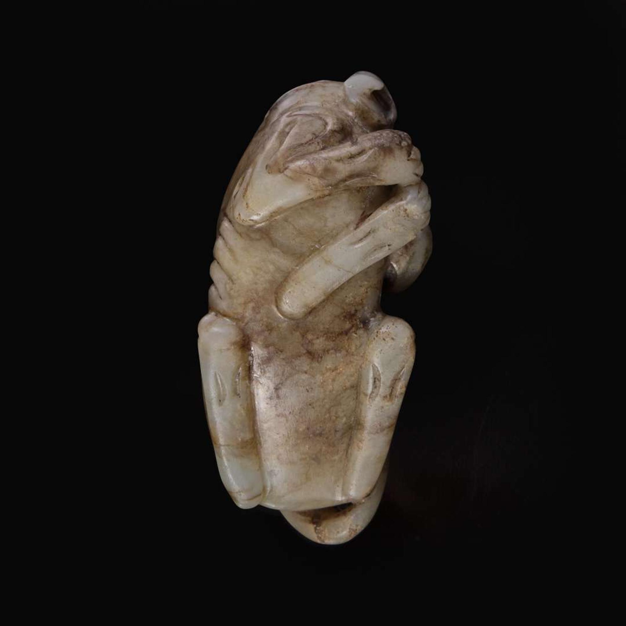 A Chinese brown and beige jade carving of a Baku 玉雕貘 Ming dynasty or earlier ????