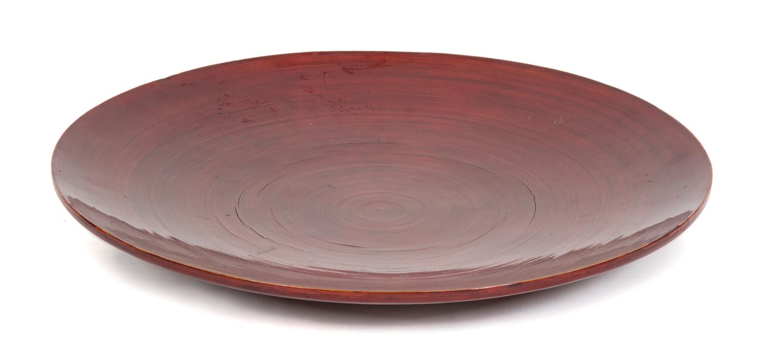 An Asian Red Lacquer Charger Diameter 21 3/4 inches. — 20TH CENTURY