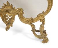 A Louis XV Style Gilt Bronze Fire Screen