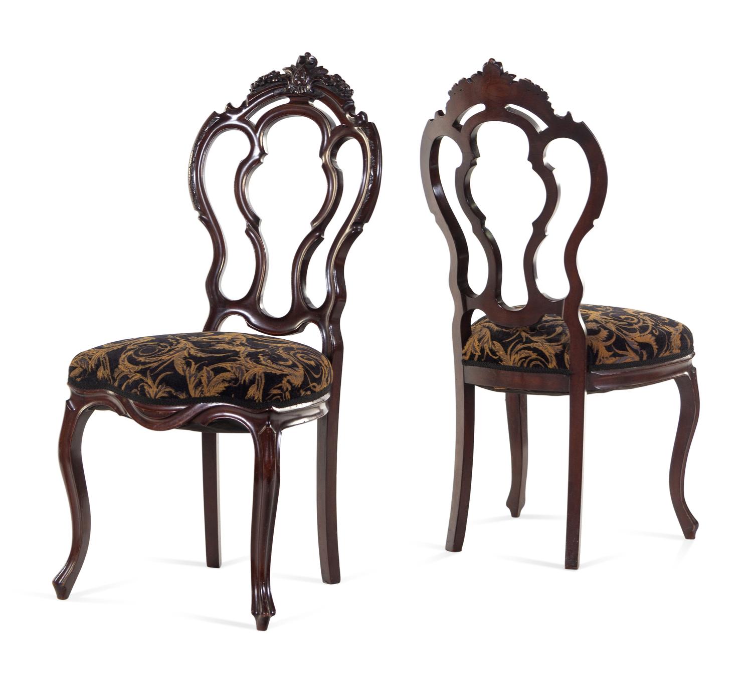 A Set of Four Rococo Revival Mahogany Side Chairs
