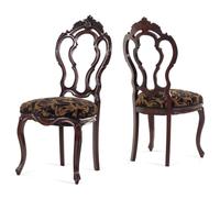 A Set of Four Rococo Revival Mahogany Side Chairs