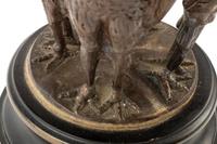 A Rock Crystal Spherical Ornament on a Bird Motif Base