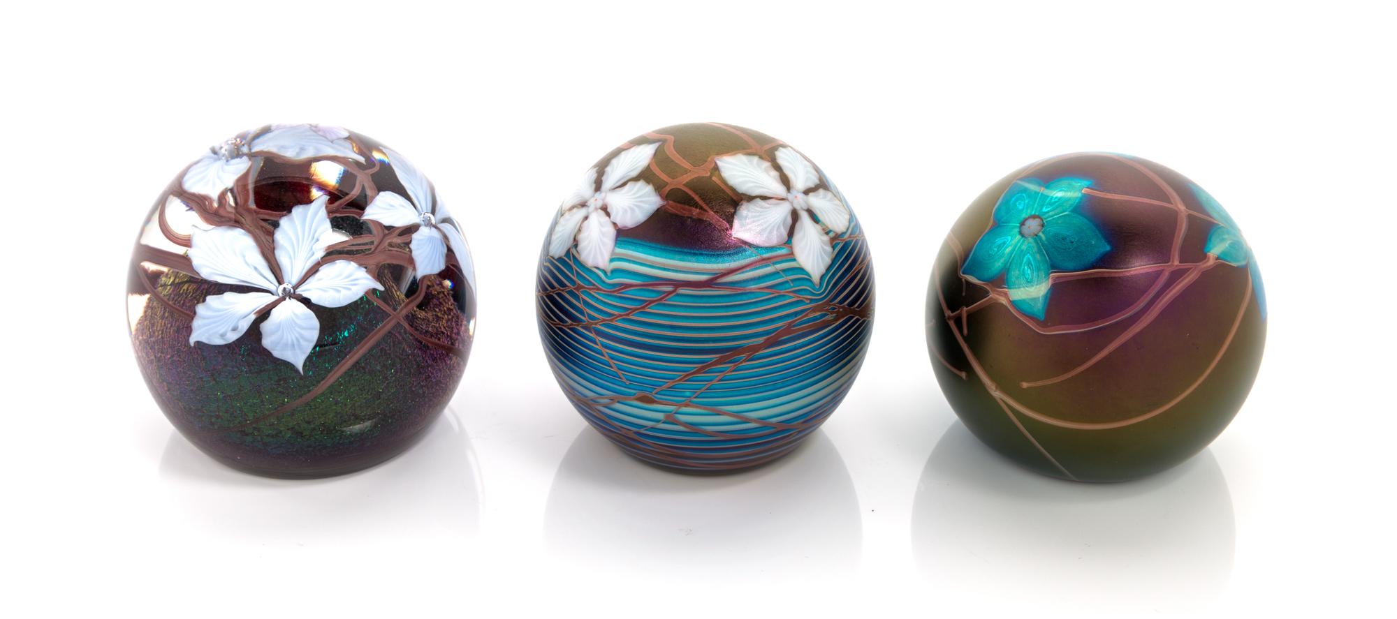 Richard Golding, STATION GLASS CO., LEICESTERSHIRE, ENGLAND, 1986-1987, a group of three glass paperweights