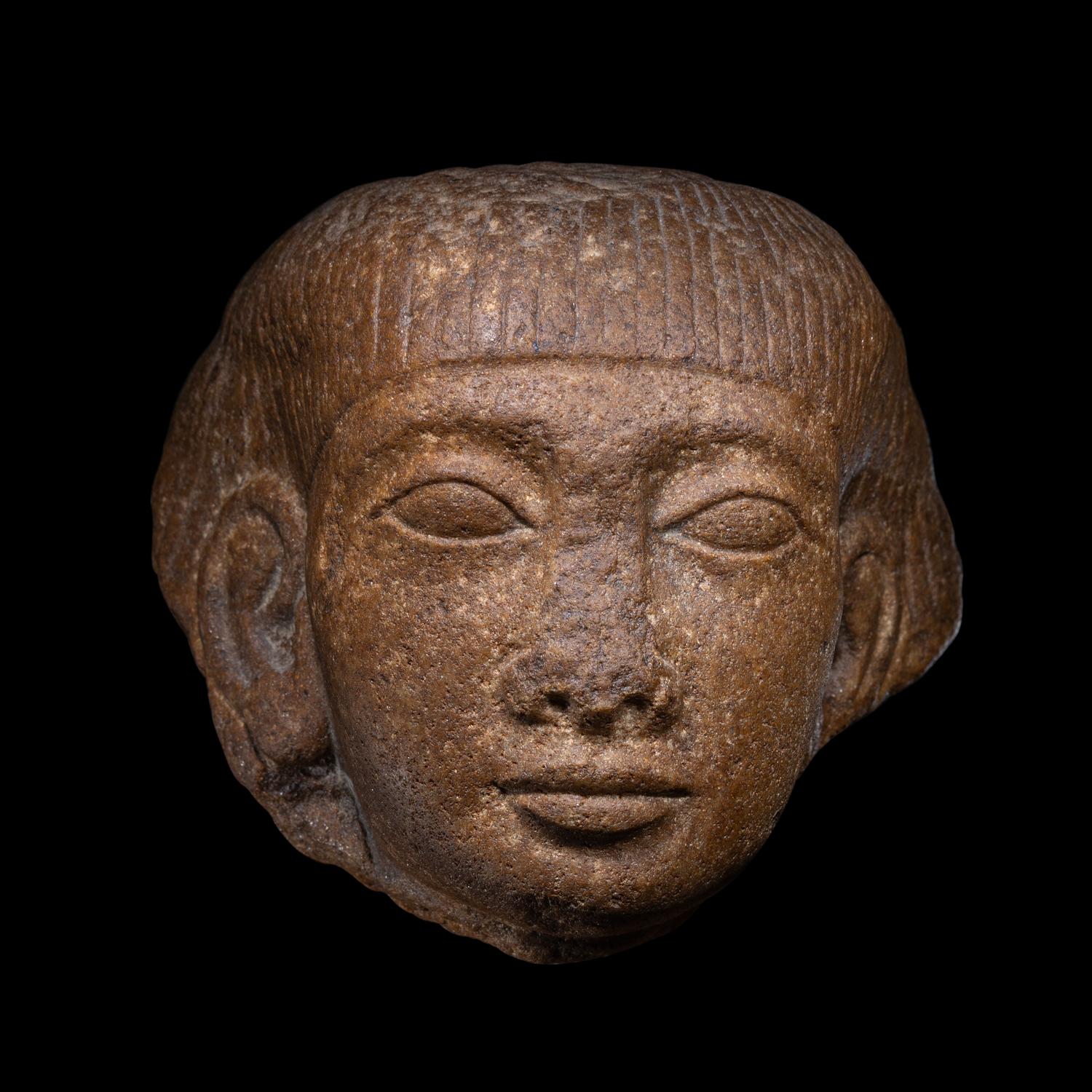 An Egyptian Quartzite Head of an Official