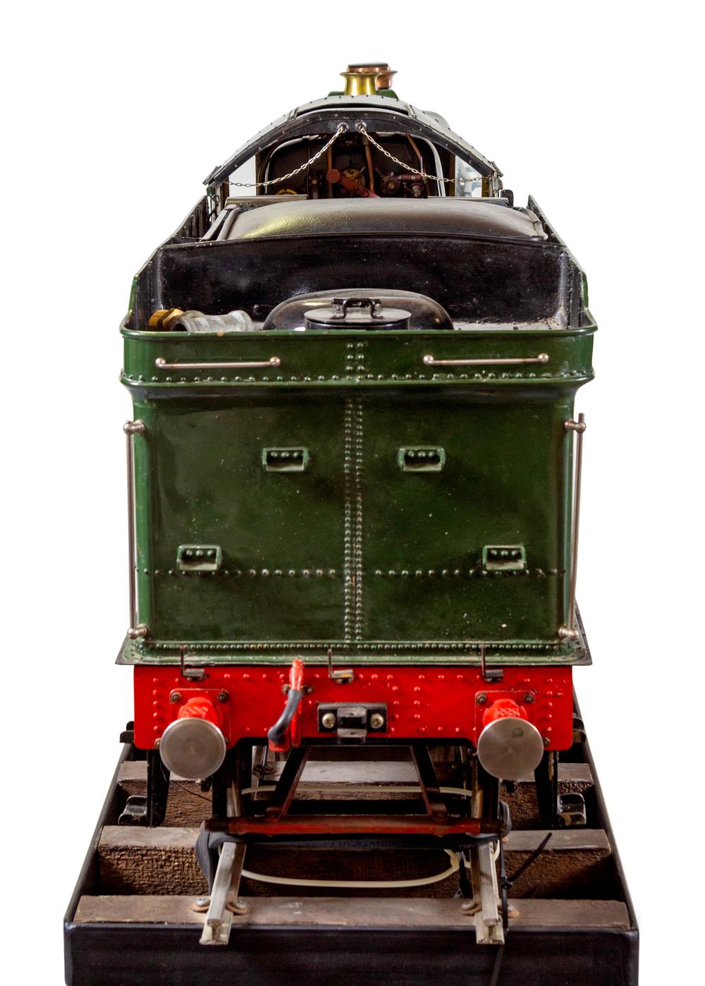 <div><!--block-->A Rare and Impressive Live Steam 7 1/4-Inch Gauge Painted Metal <em>Great Western Railway-Class 6000:</em> <em>King George V</em> Locomotive and Ride-On Tender</div>