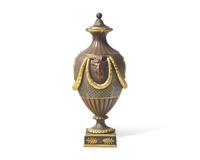 A Wedgwood Brown Glazed and Parcel Gilt Black Basalt Covered Urn