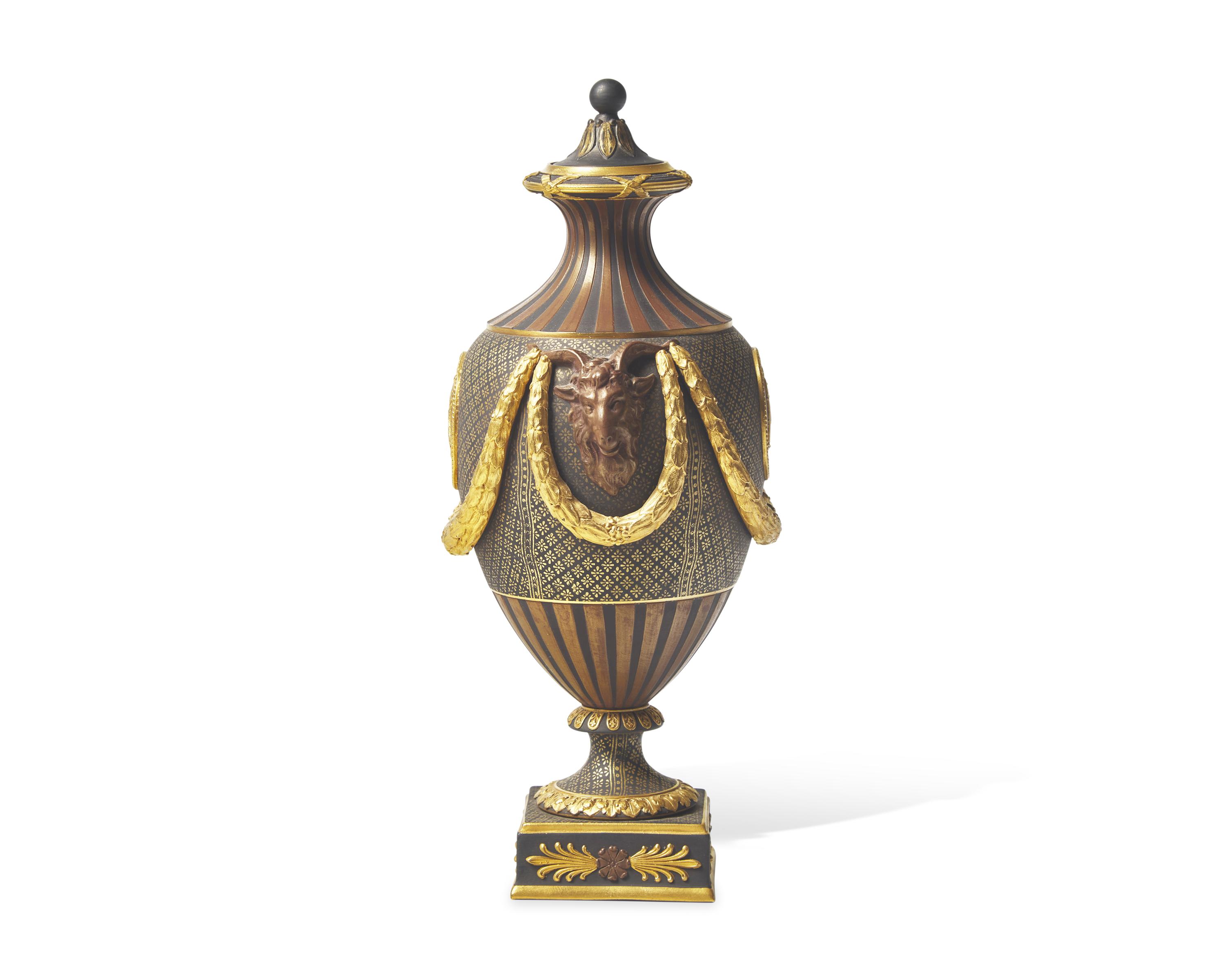 A Wedgwood Brown Glazed and Parcel Gilt Black Basalt Covered Urn