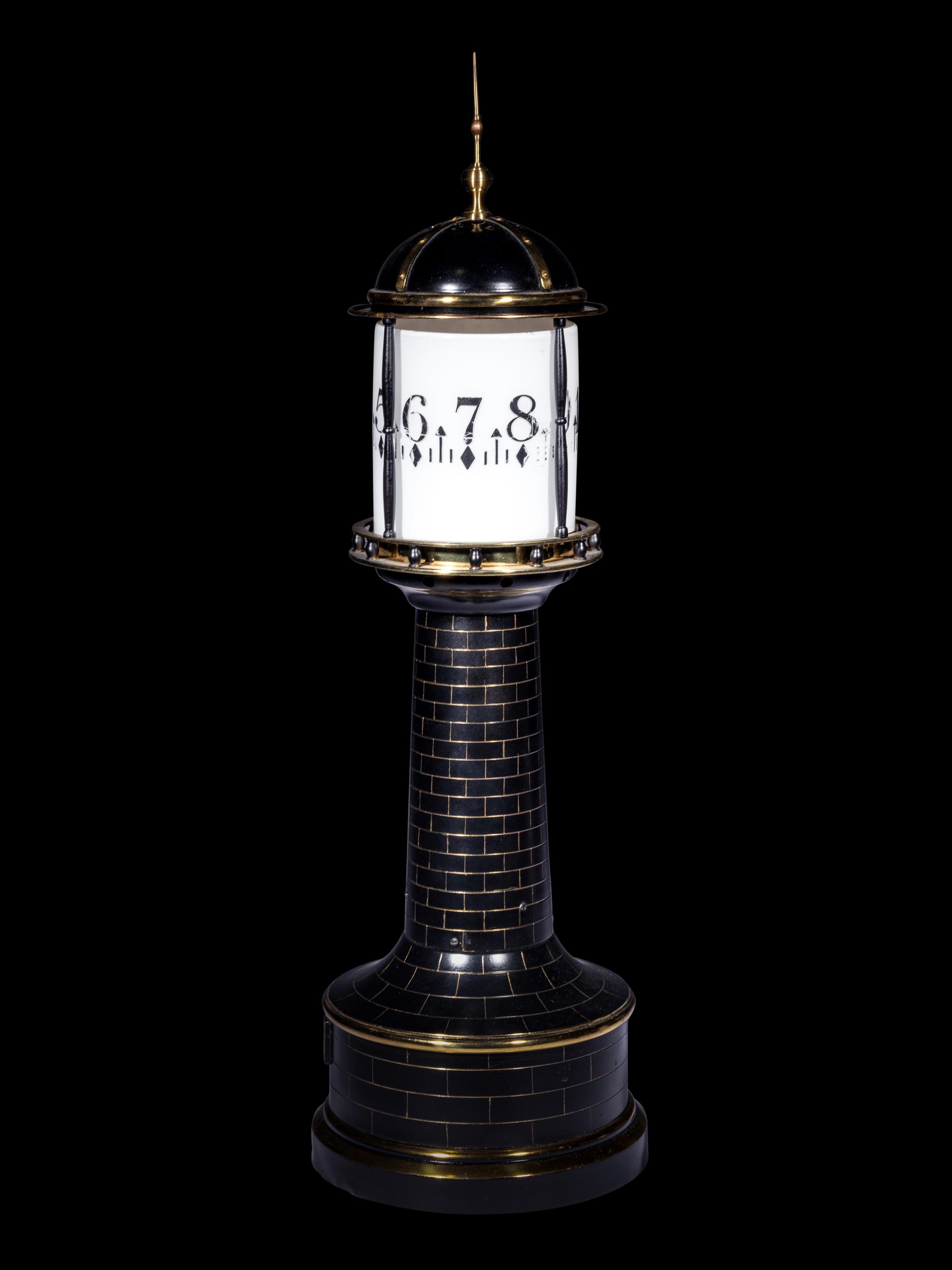 A Gilt and Patinated Lighthouse Annular Clock