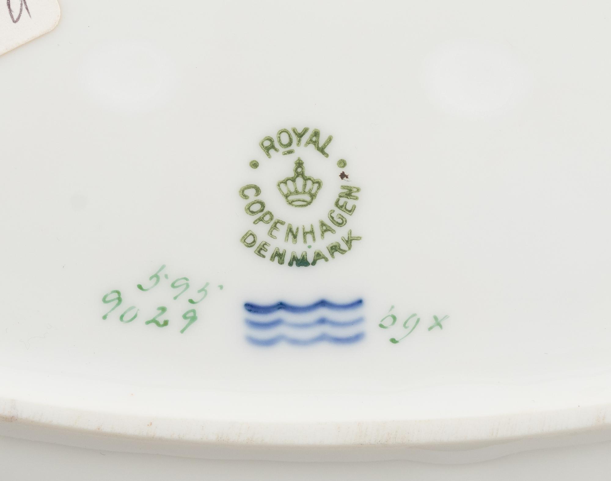 A Royal Copenhagen Golden Basket Porcelain Dinner Service