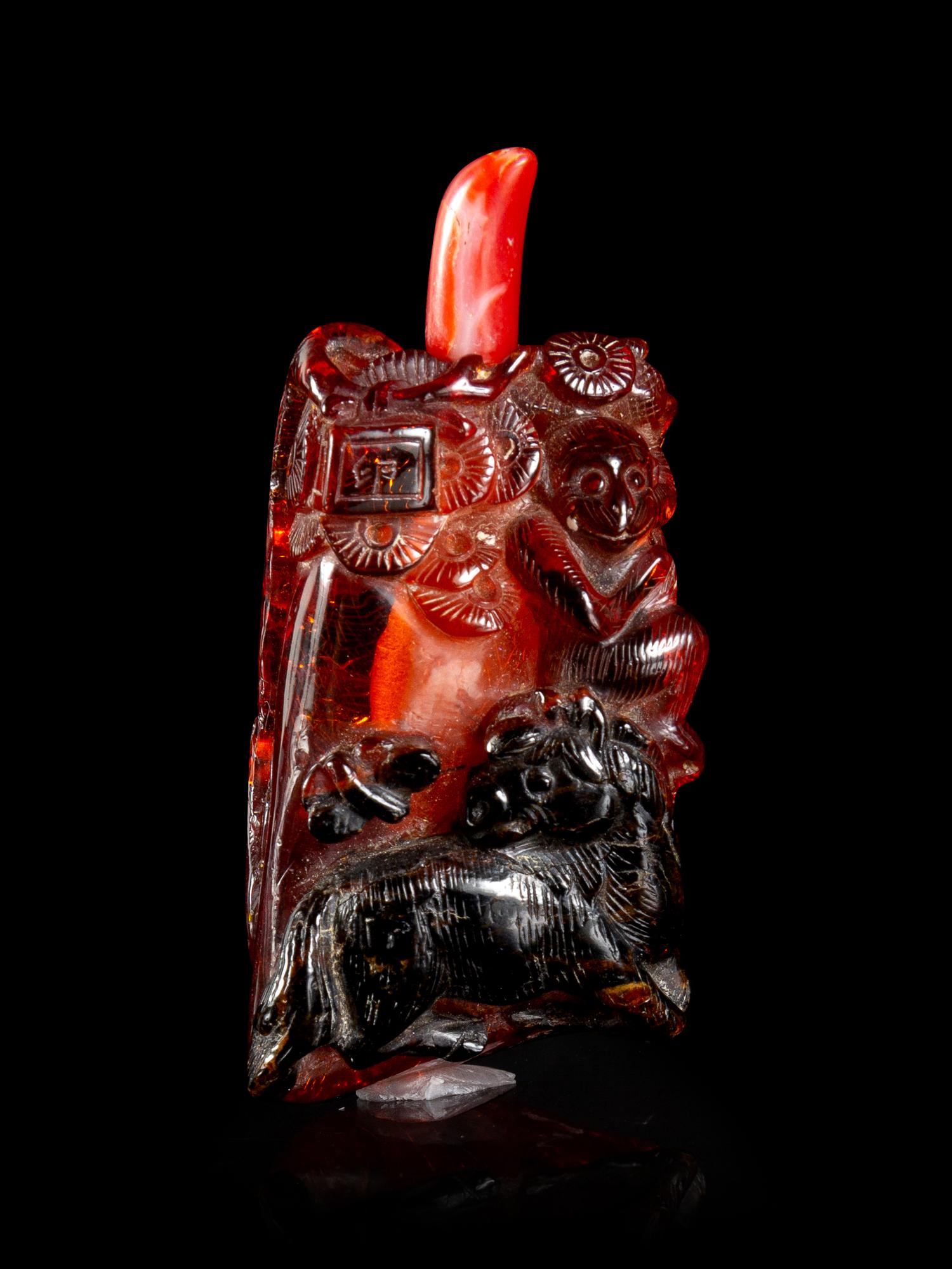 An Amber 'Horse and Monkey' Snuff Bottle
