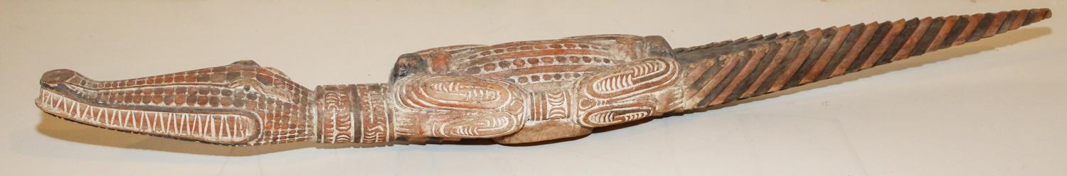 A Carved Wood Alligator Length 43 1/4 inches.