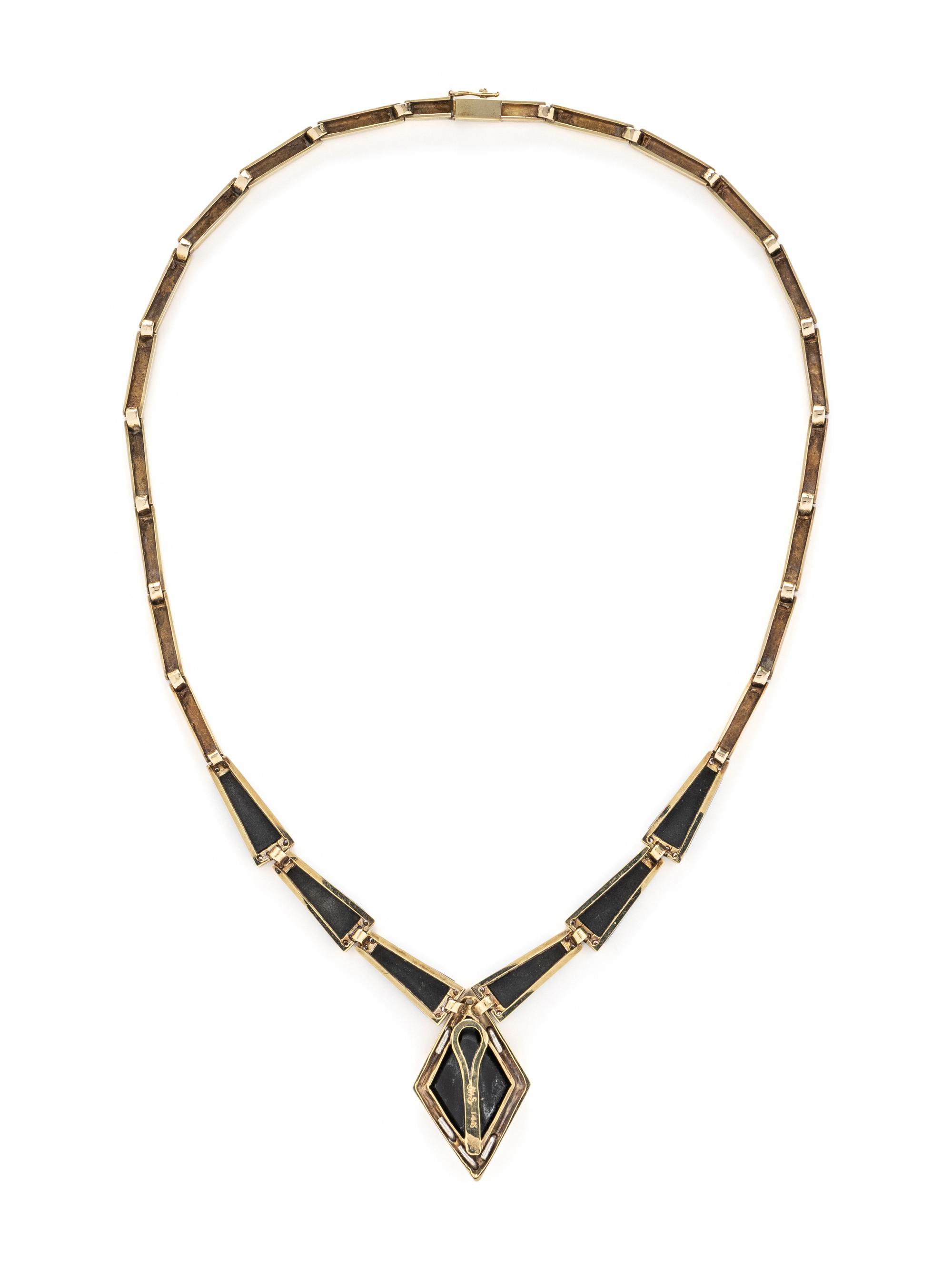 YELLOW GOLD, ONYX, AND DIAMOND NECKLACE