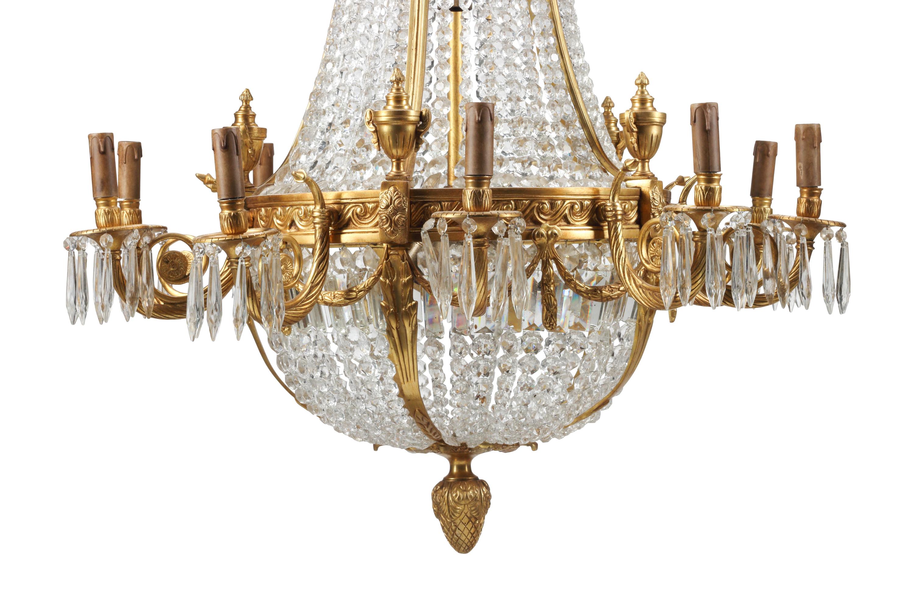 A Pair of French Neoclassical Style Gilt Bronze and Cut Glass Ten-Light Chandeliers