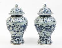 A Pair of Blue and White Porcelain Jars and Covers Height 14 inches.