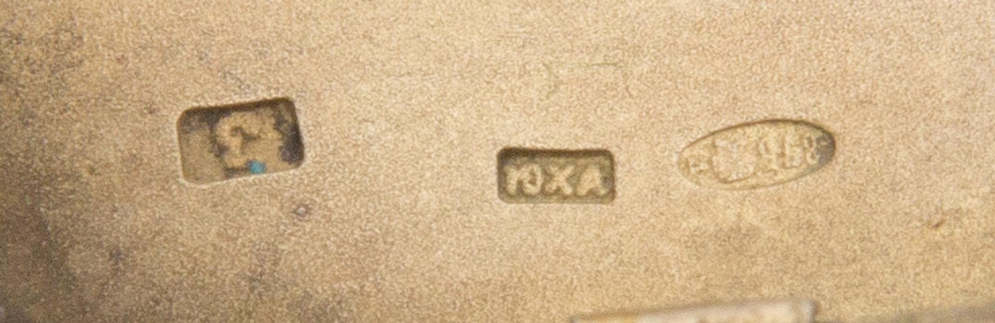 A Soviet-Era Russian Silver Cigarette Case, Maker's Mark Obscured, Moscow, Mid-20th Century, the lid engraved to show symbols of the So