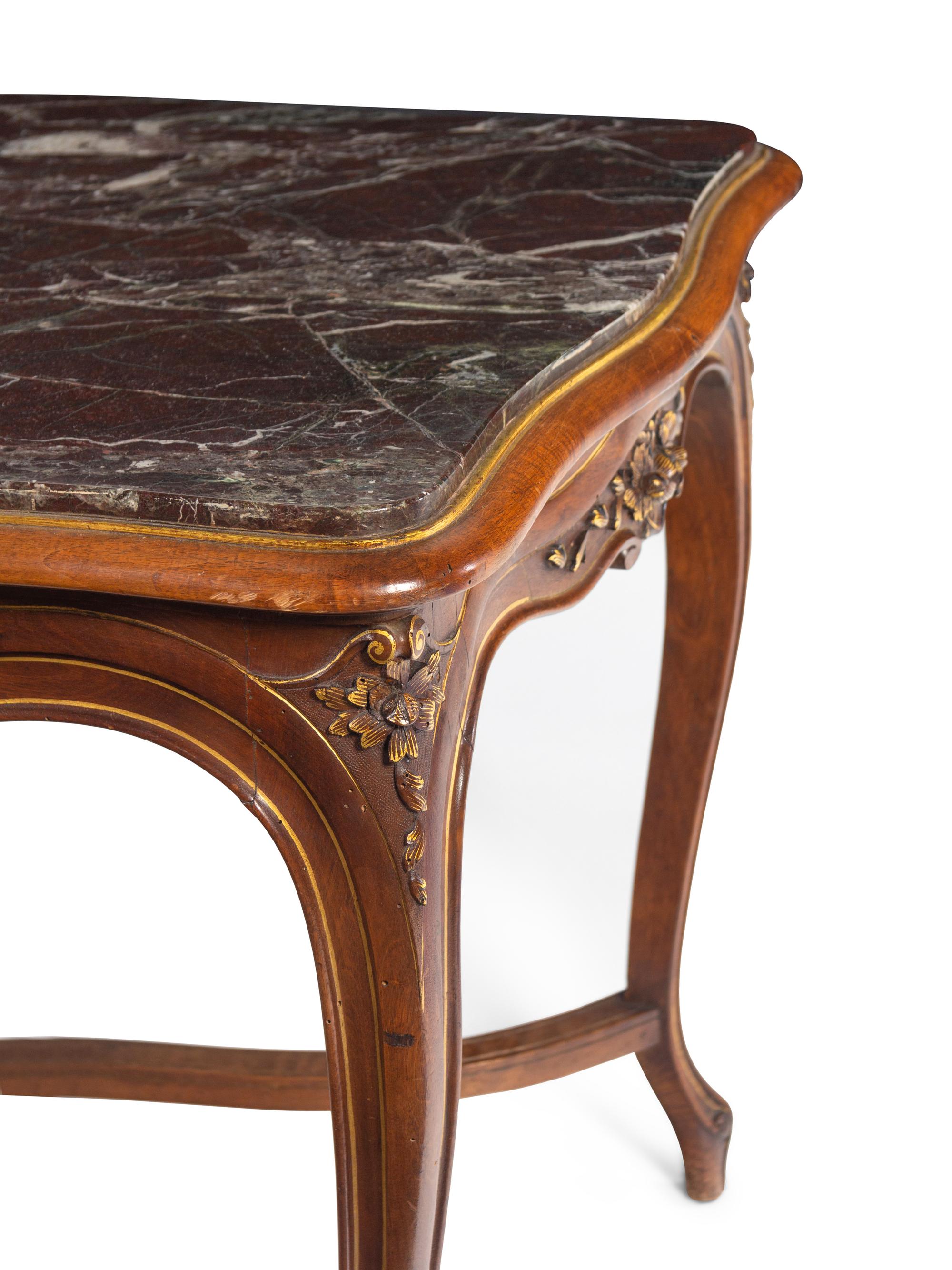 An Italian Louis XV Style Carved Walnut Marble-Inset Serpentine-Top Center Table