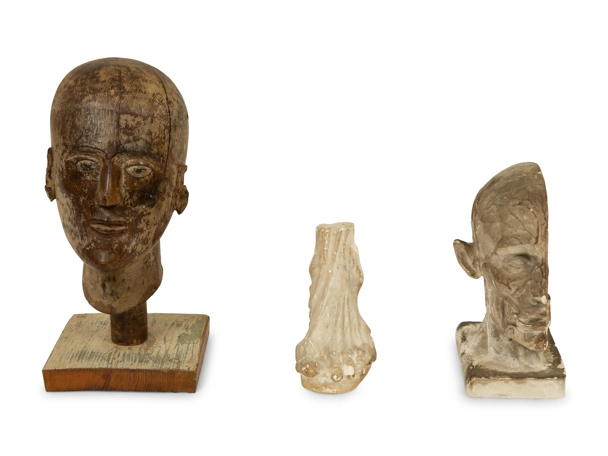 Two Plaster Studies of a Foot and a Profile Head together with a Continental Carved Wood Bust — 20TH CENTURY