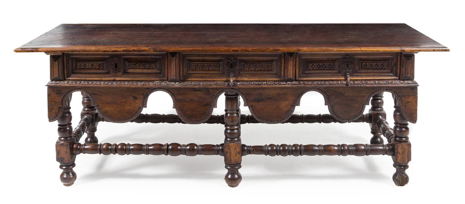 An Italian Baroque Walnut Table Height 31 1/4 x width 88 1/2 x depth 28 1/4 inches. — 17TH/18TH CENTURY AND LATER