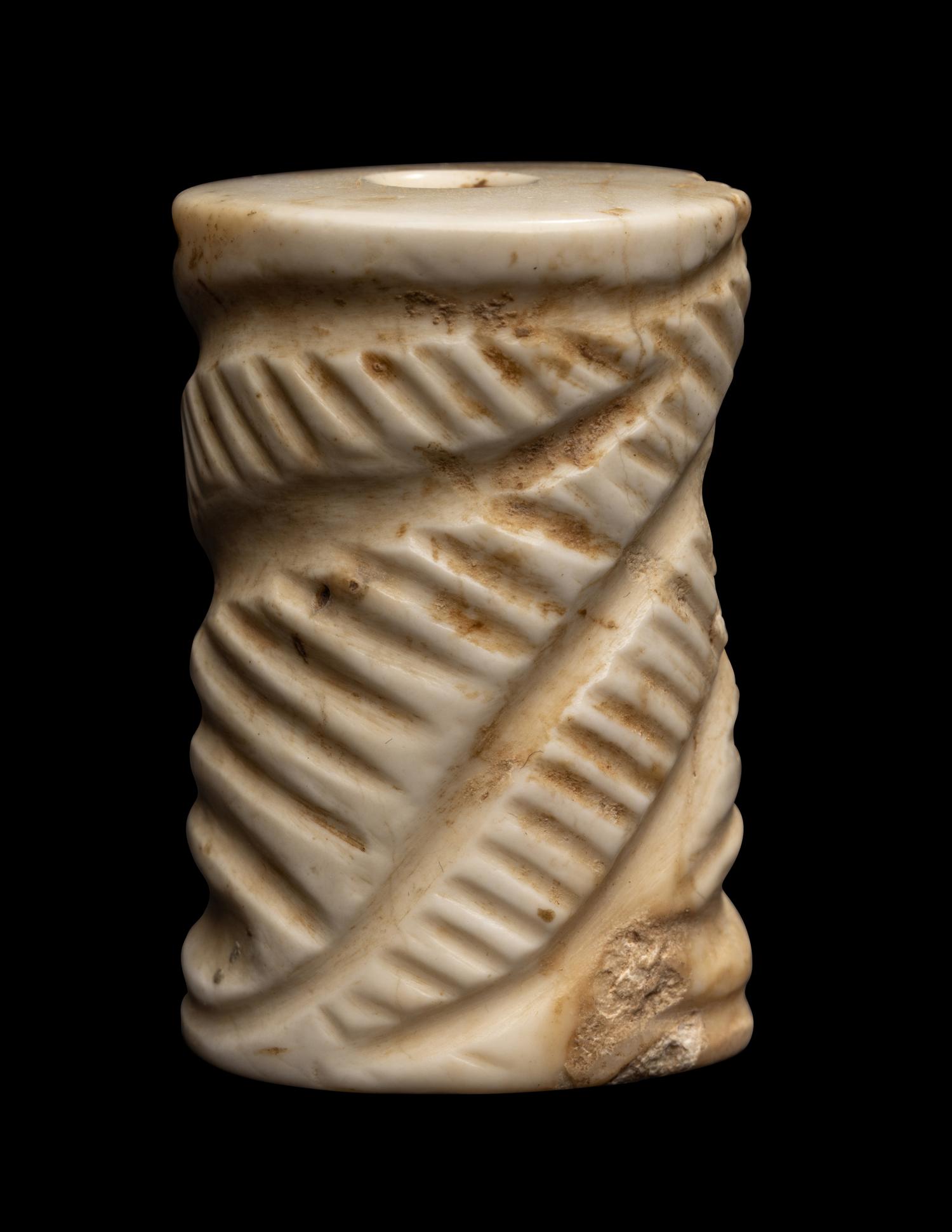 A Mesopotamian Limestone Cylinder Seal