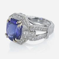 A 14K white gold, tanzanite, and diamond ring