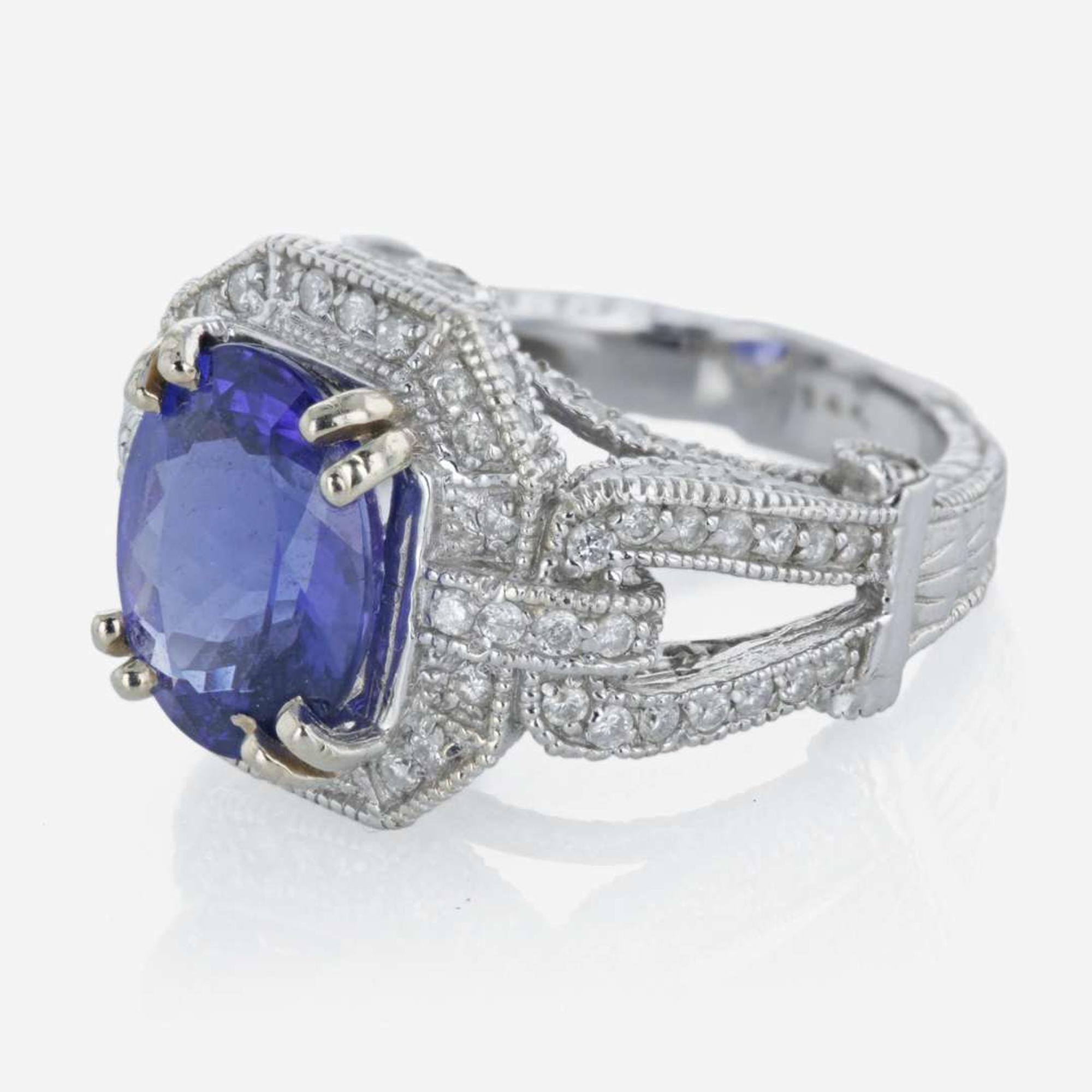 A 14K white gold, tanzanite, and diamond ring