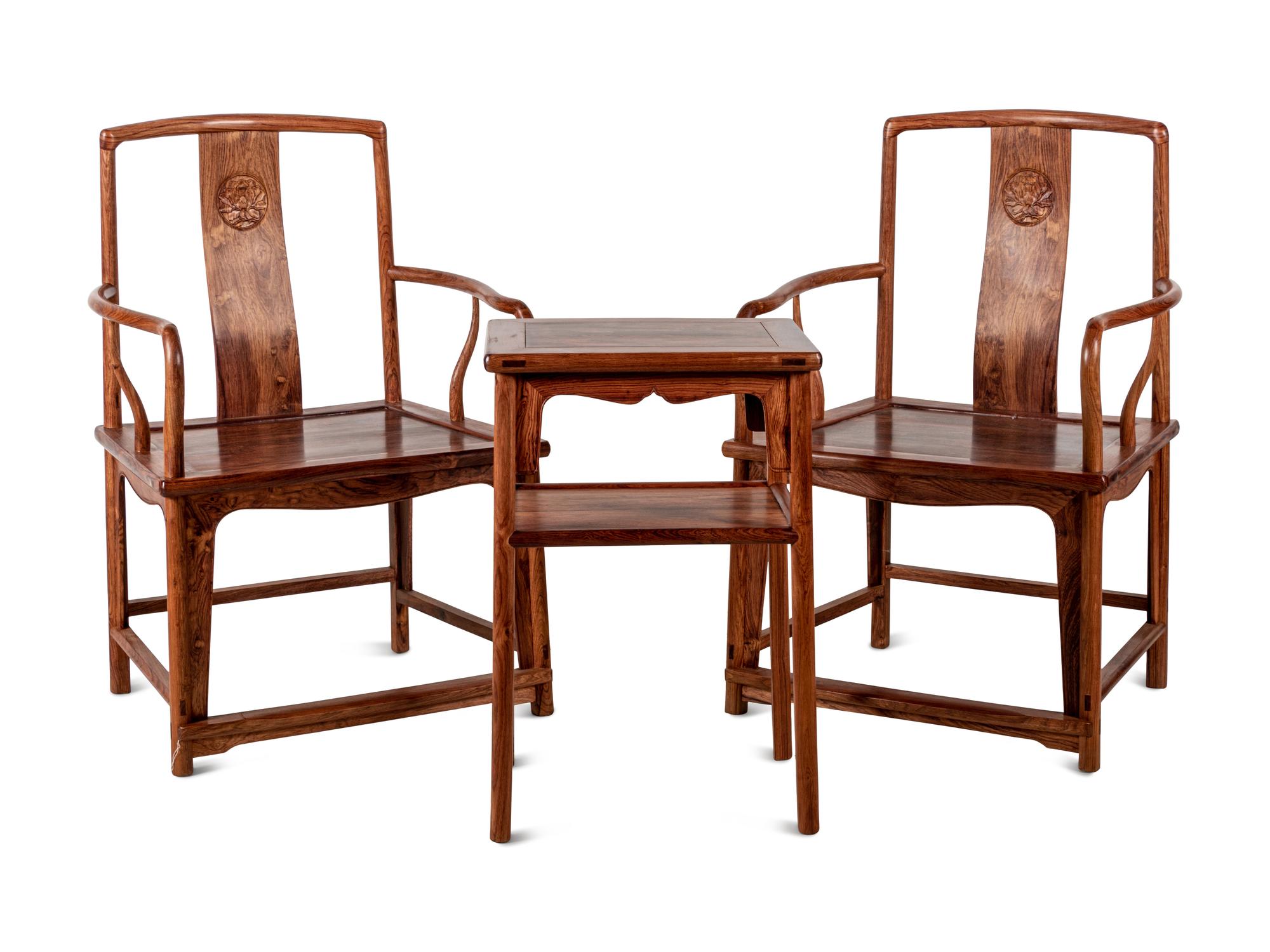 A Set of Chinese Huanghuali Armchairs and Side Table, Nanguanmaoyi