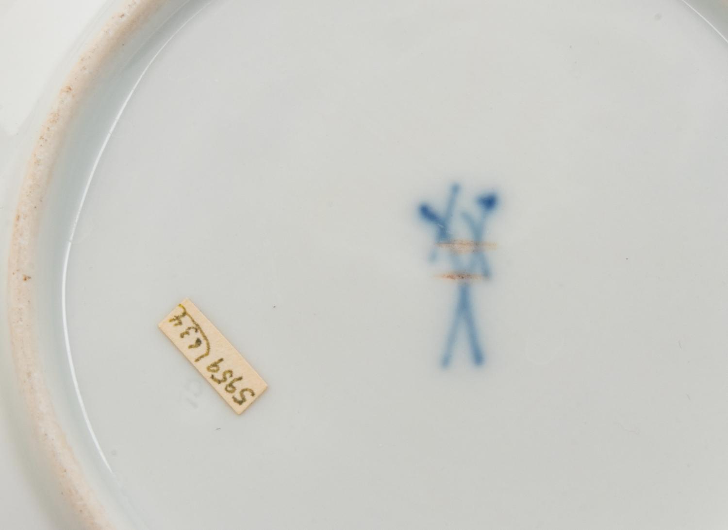 Three Meissen and Berlin (K.P.M.) Porcelain Cup and Saucer Sets