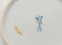 Three Meissen and Berlin (K.P.M.) Porcelain Cup and Saucer Sets
