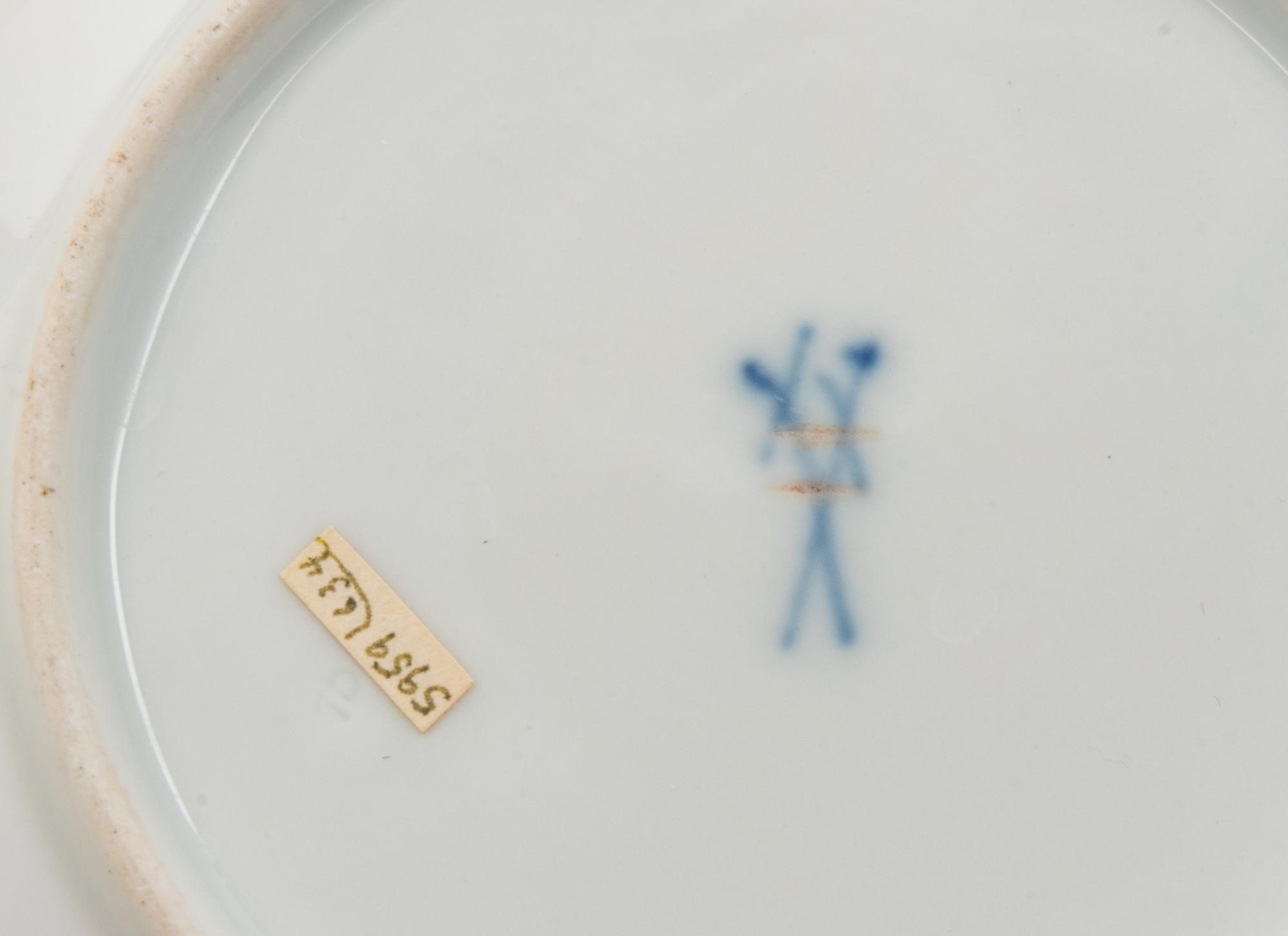 Three Meissen and Berlin (K.P.M.) Porcelain Cup and Saucer Sets