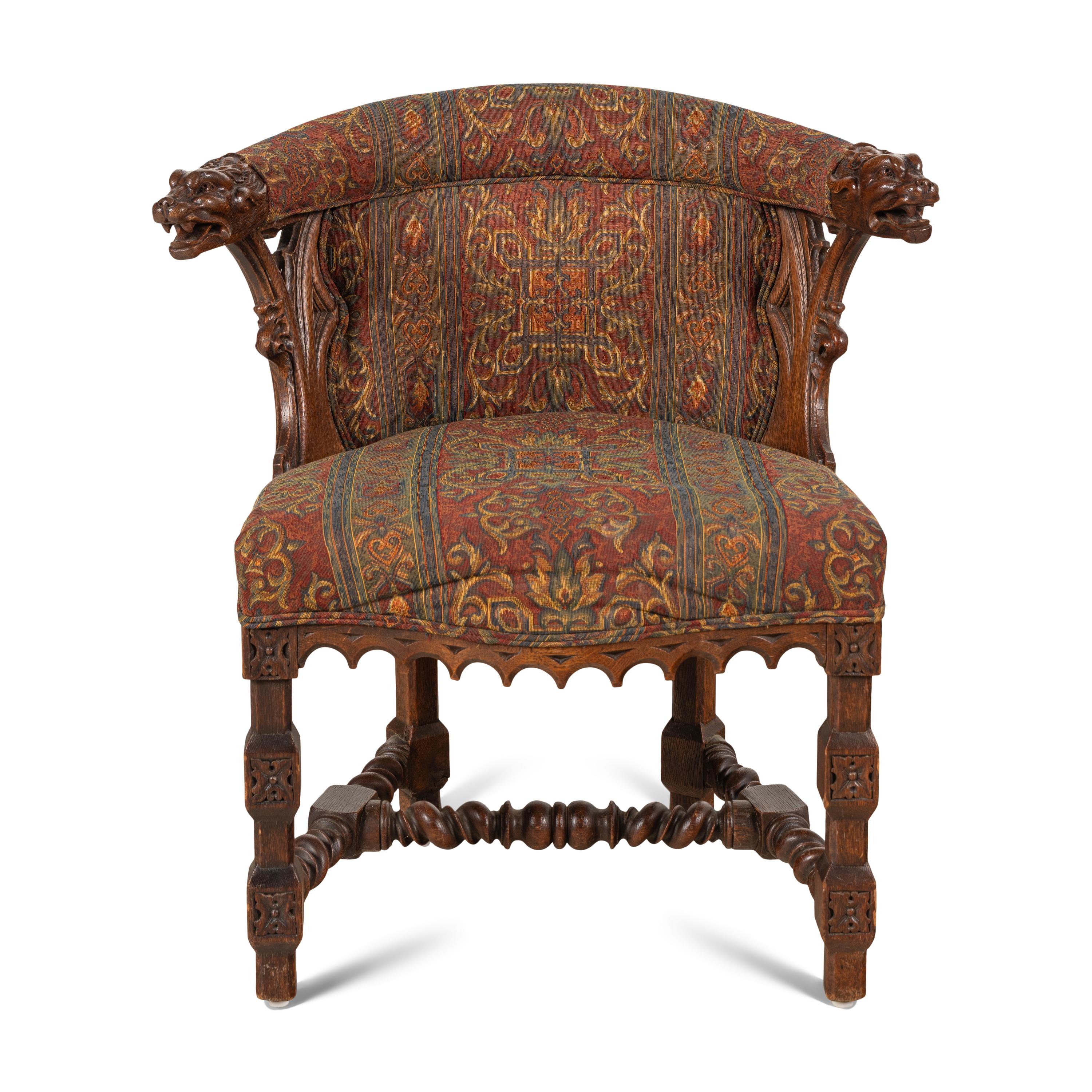 A French or Italian Gothic Revival Carved Oak Armchair