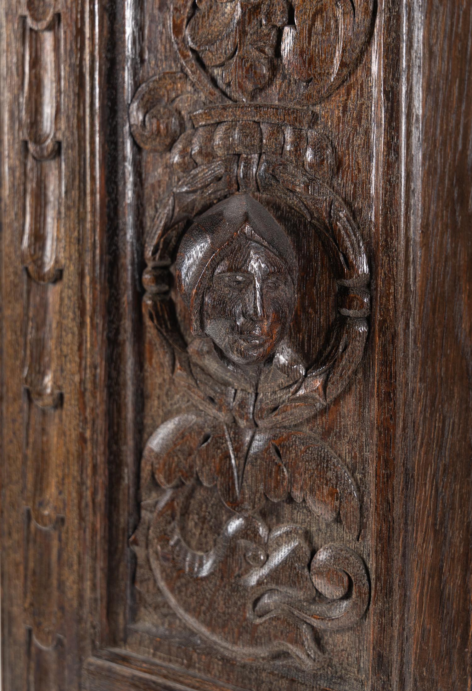 A Renaissance Style Carved Oak Cabinet