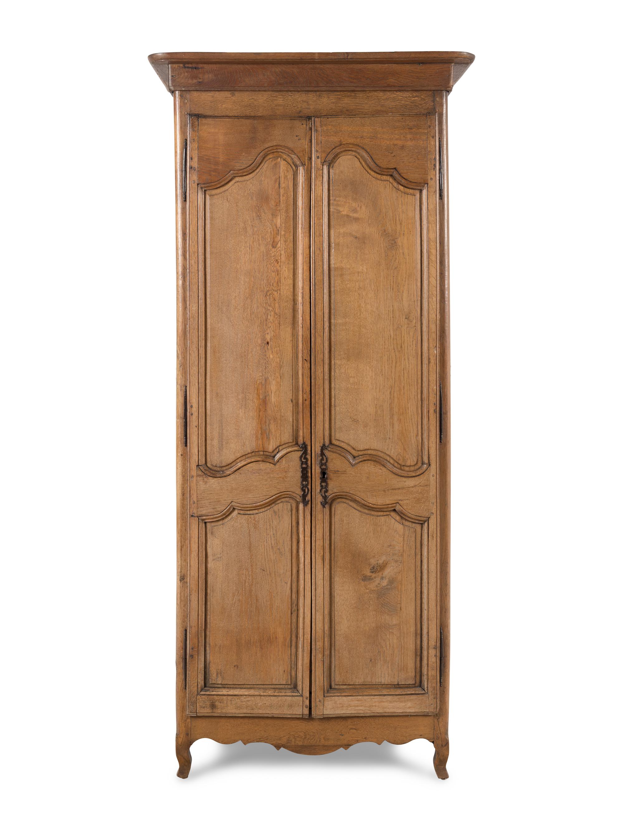 A French Provincial Walnut Armoire