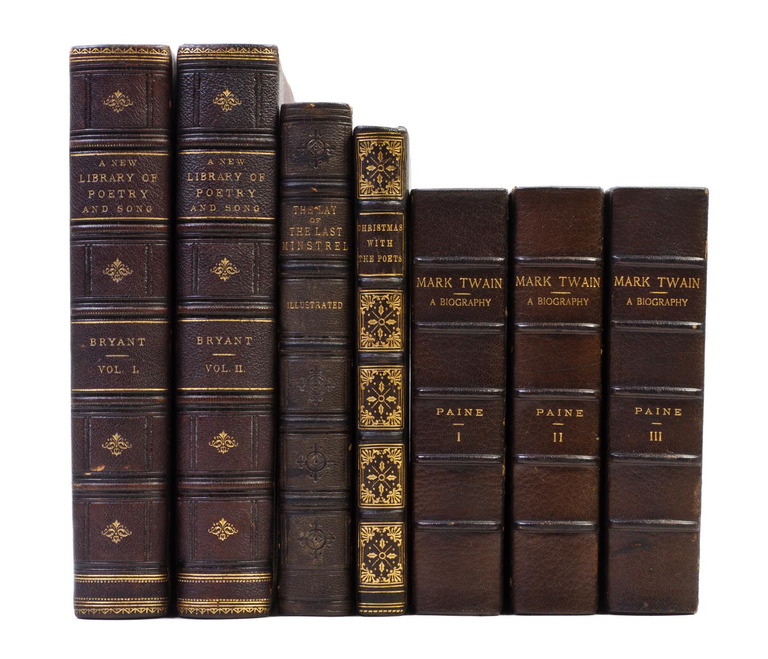 (BINDINGS) A group of 7 leather-bound volumes.