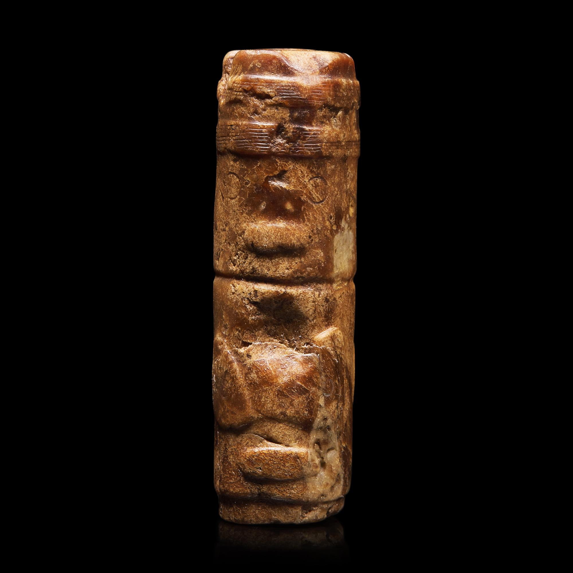 An Archaic Chinese Jade Pendant with Mask, Liangzhu Culture, and a Jade Jue, Western Zhou 良渚文化神人獸面紋玉勒及西周玉玨各一