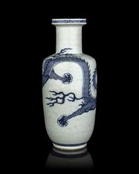 A Chinese Incised Celadon Ground Underglaze Blue 'Dragon' Rouleau Vase