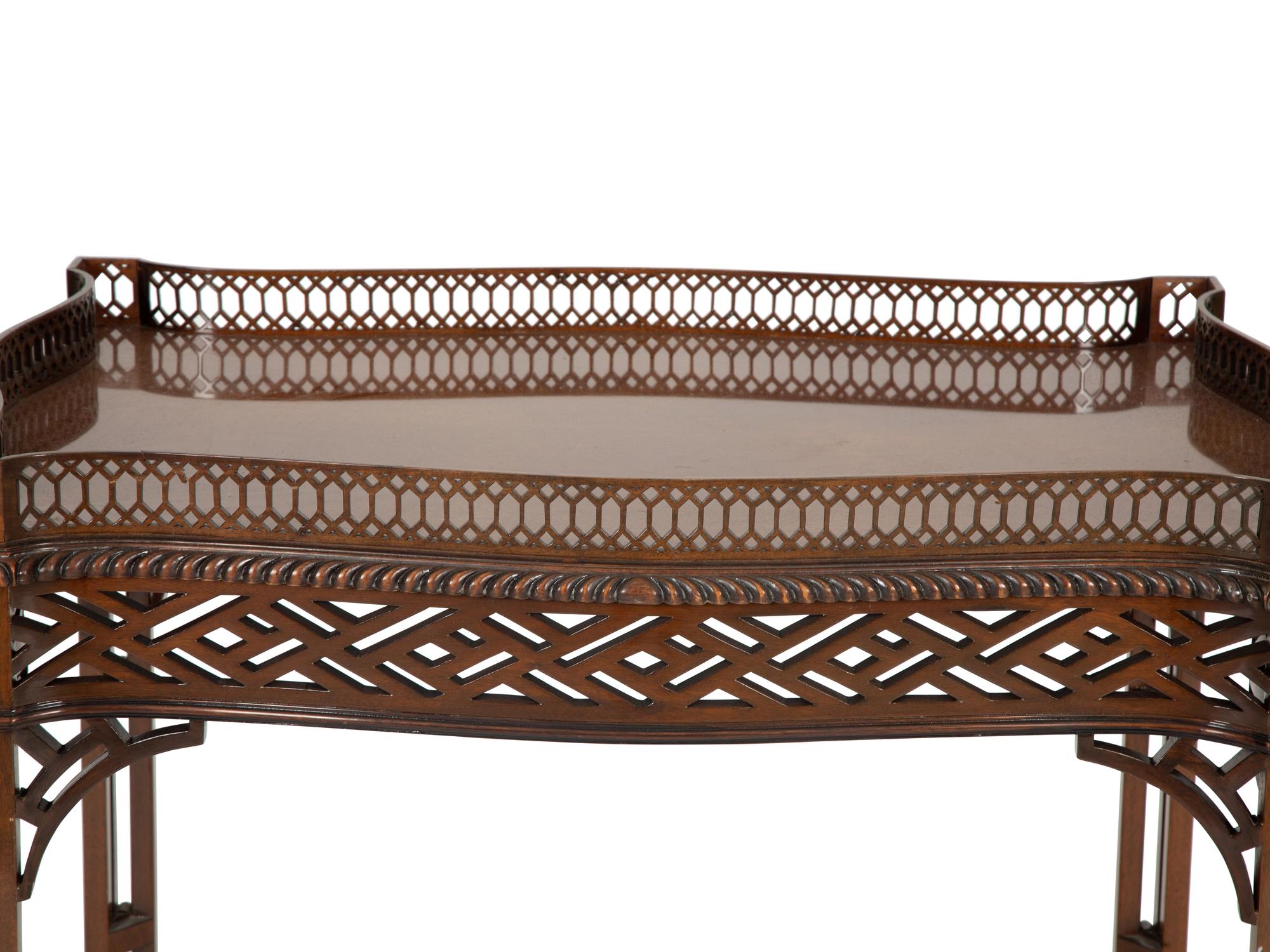 A George III Style Mahogany Tea Table with Pierced Gallery Top