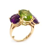 A 14 Karat Yellow Gold, Peridot and Amethyst Ring, 5.95 dwts.