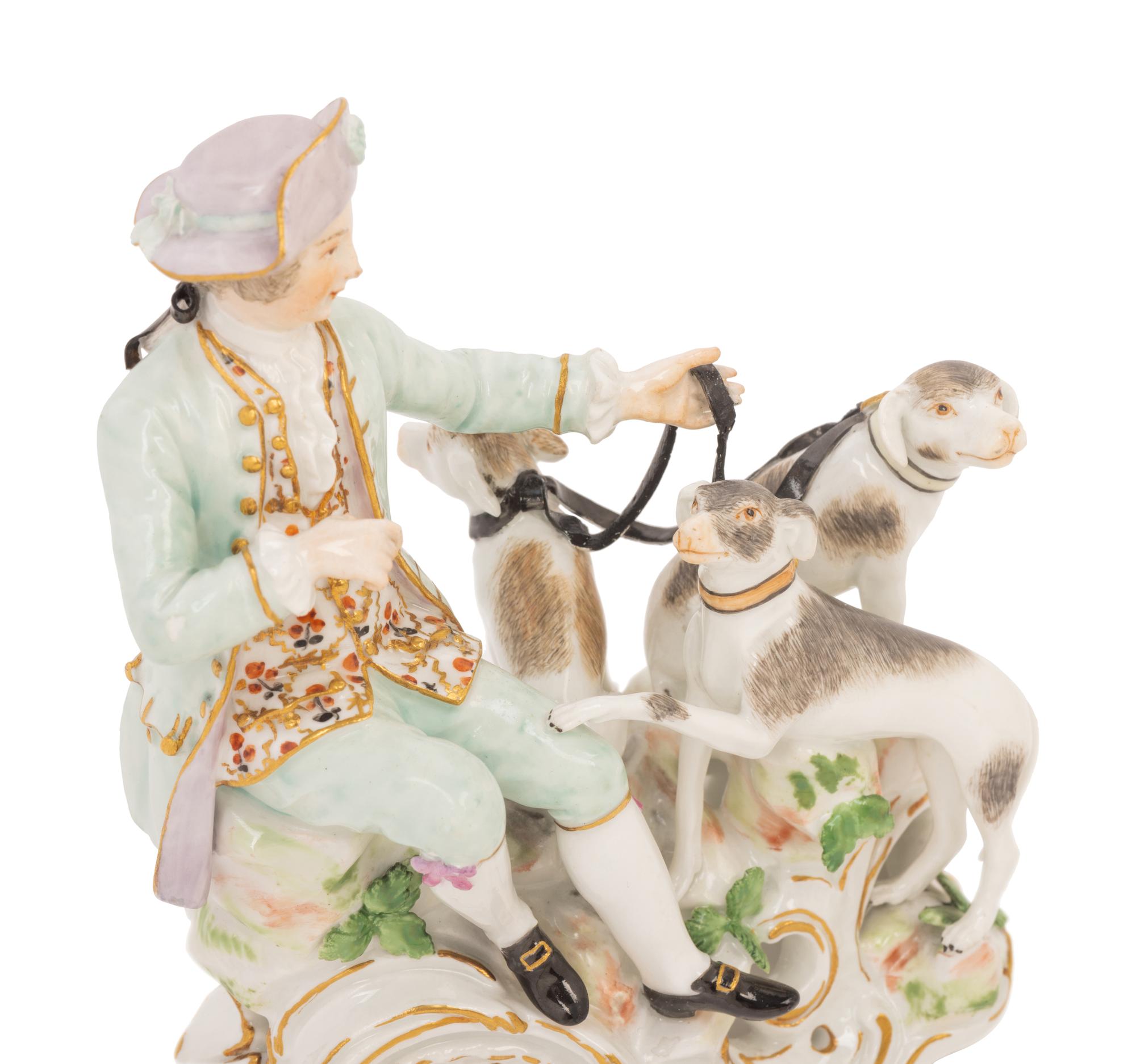 A Meissen Porcelain Figural Group of a Man with Hounds