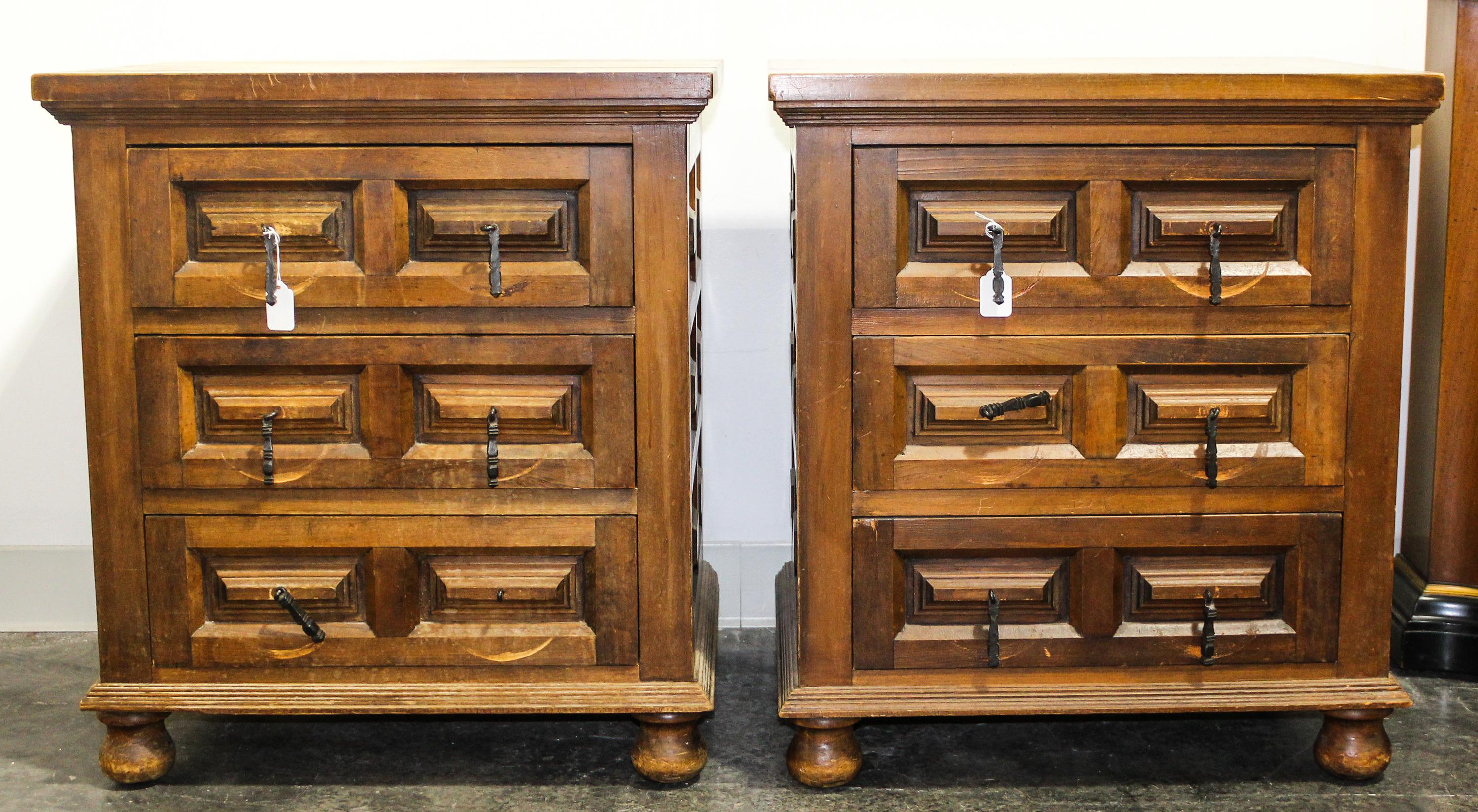 A Pair of Mexican Pine Night Tables Height 26 1/4 x width 23 1/2 x depth 17 3/4 inches.