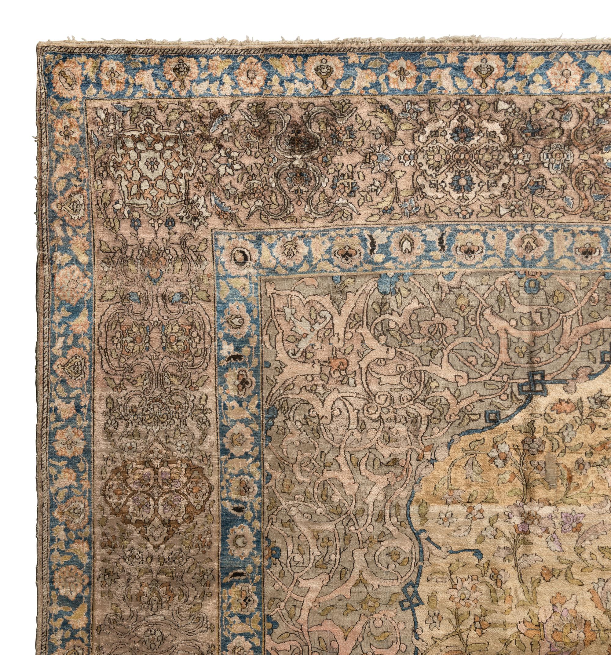 A Kashan Silk Carpet