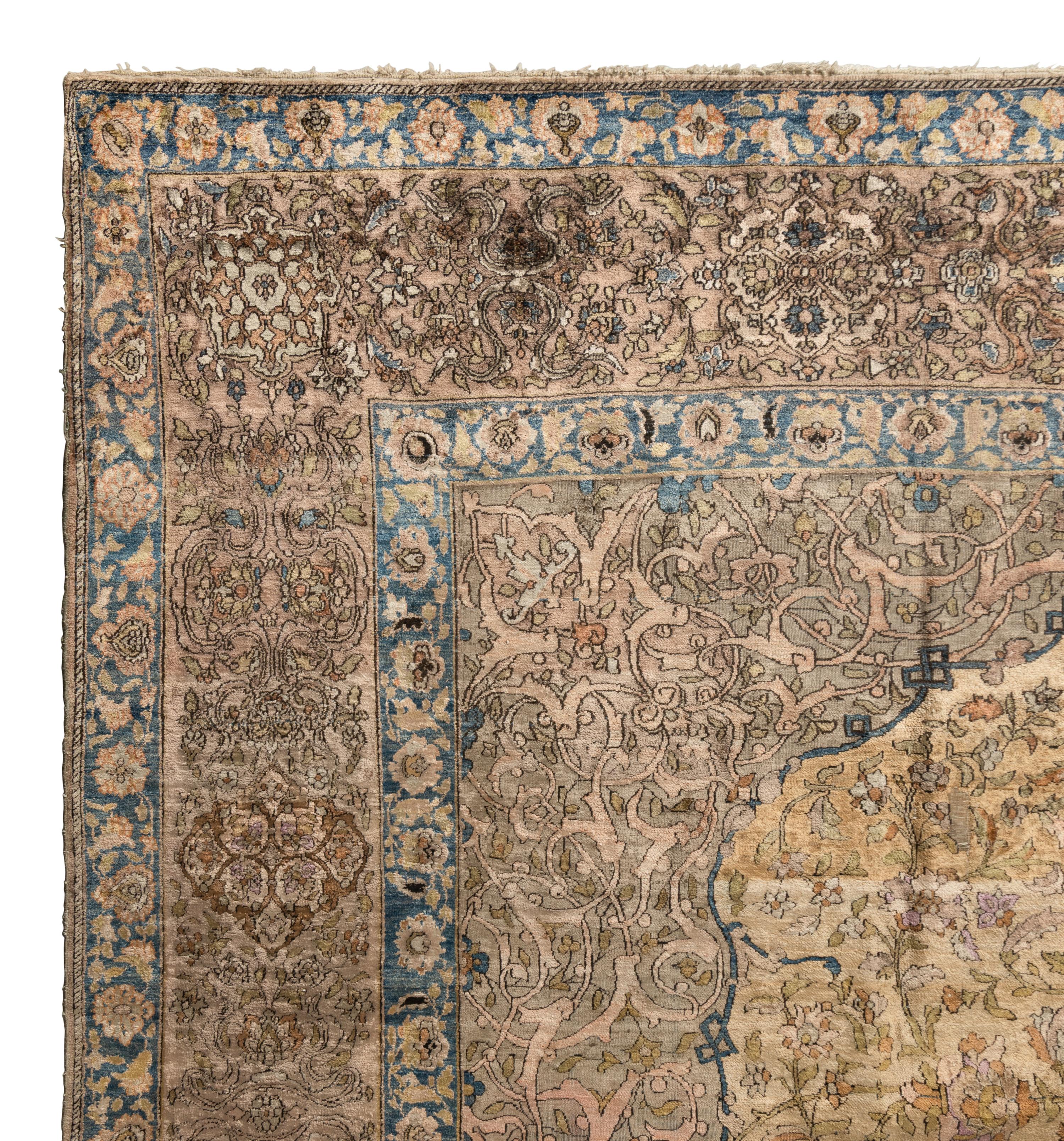 A Kashan Silk Carpet