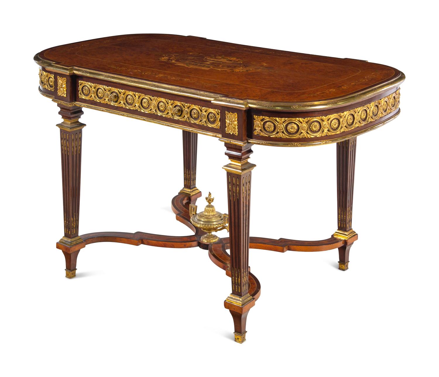 A Louis XVI Style Gilt Bronze Mounted Amboyna and Marquetry Center Table