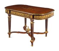 A Louis XVI Style Gilt Bronze Mounted Amboyna and Marquetry Center Table