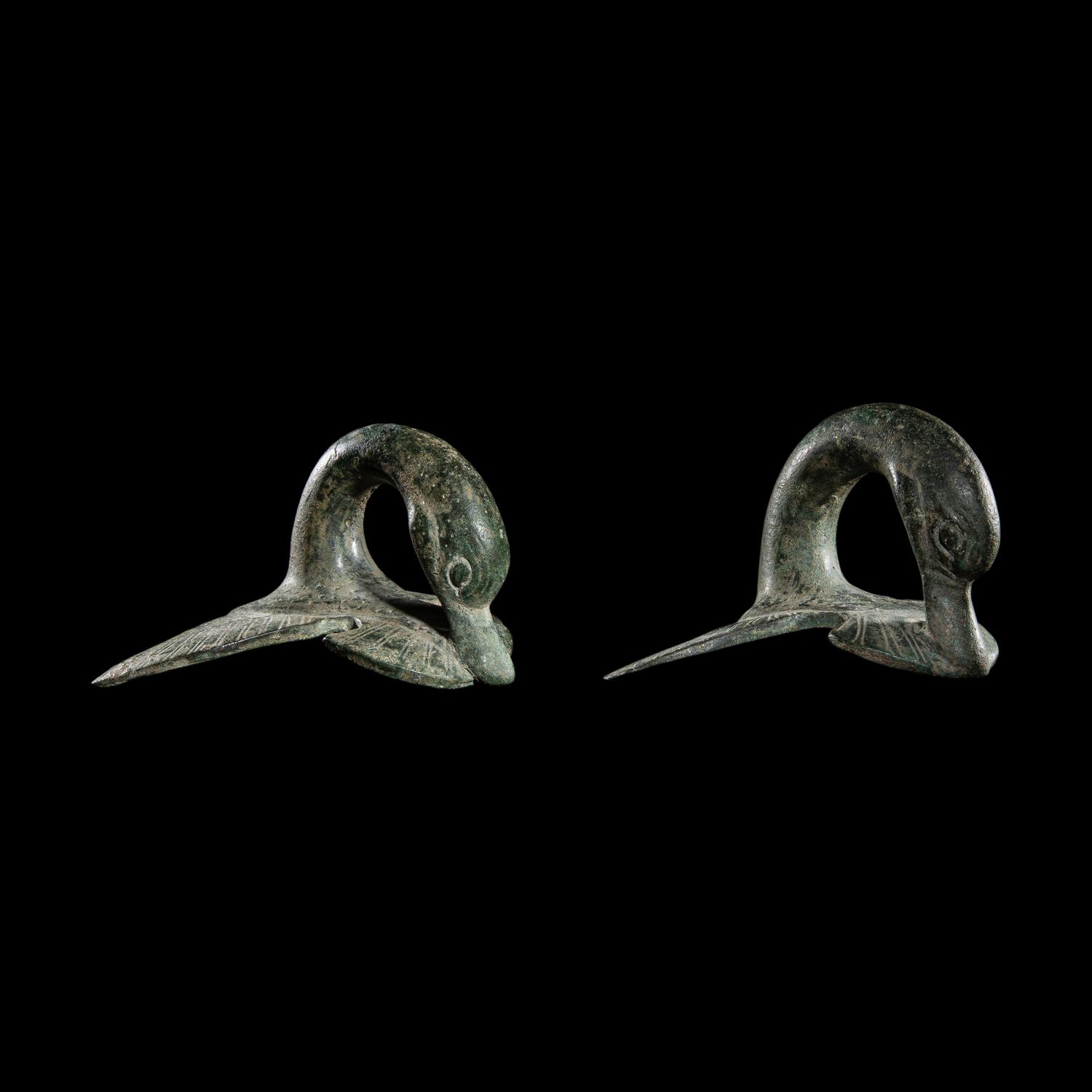 A Pair of Etruscan Bronze Vessel Handles