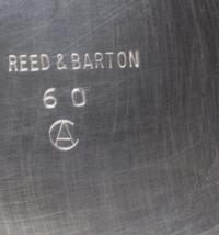 An American Silver-Plate Center Bowl, Reed & Barton, Taunton, MA, of oval form with ribbed sides and a similarly worked oval foot.