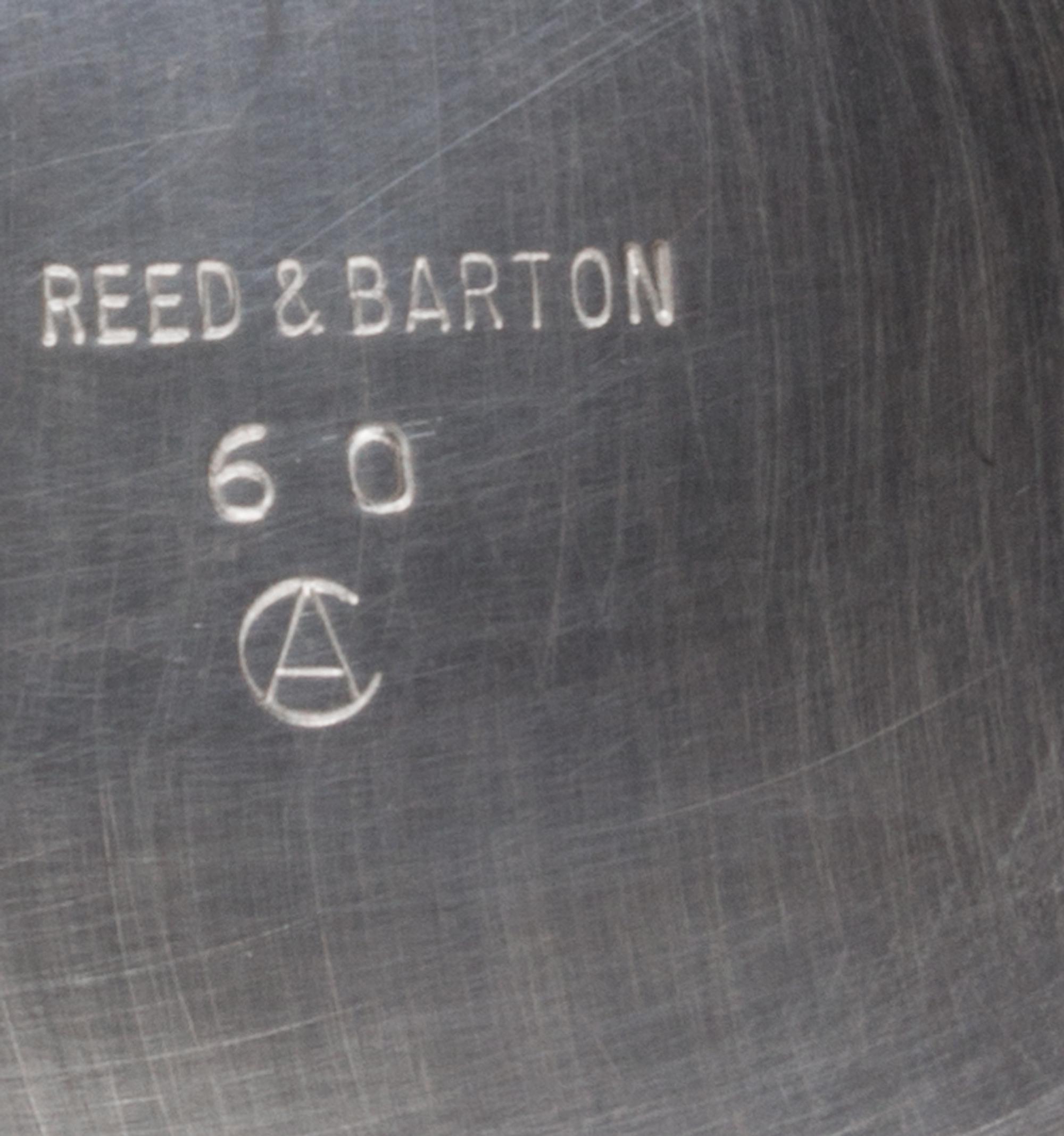 An American Silver-Plate Center Bowl, Reed & Barton, Taunton, MA, of oval form with ribbed sides and a similarly worked oval foot.