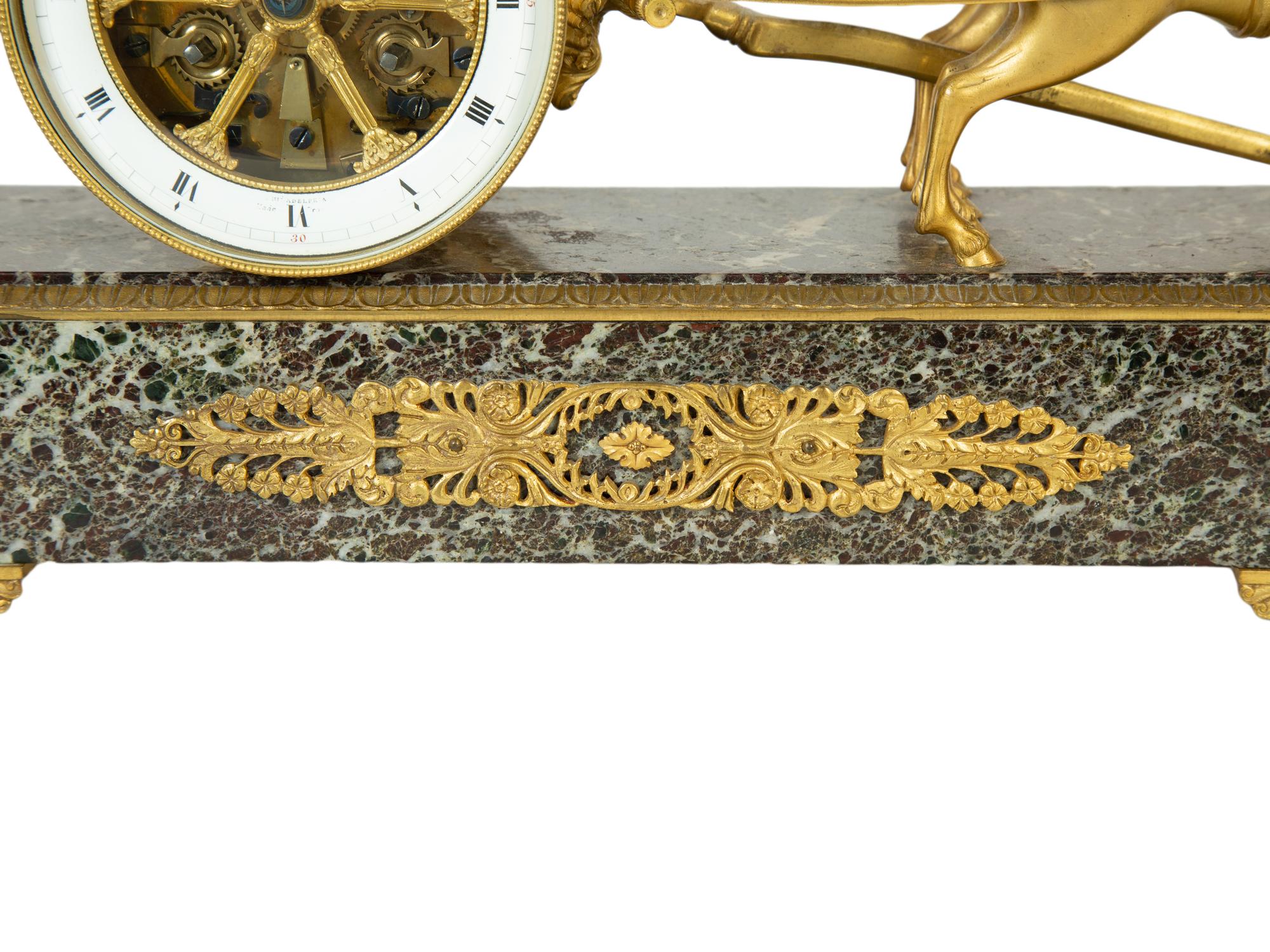 A French Gilt Bronze and Marble Mantel Clock